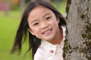 Little Chinese girl posed for a photo shoot