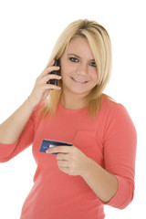 Beautiful Caucasian female using a credit card