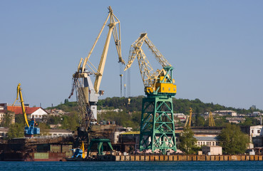 Fototapeta premium Cranes in port of the city Sevastopol