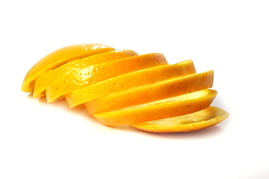 A skin from orange is cut rings.