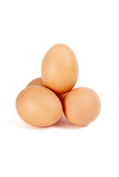 Few eggs isolated on the white background