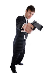 security guard in black suit and pistol in hand