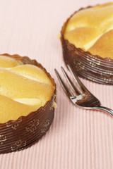 Cakes on wooden background. Shallow depth of field