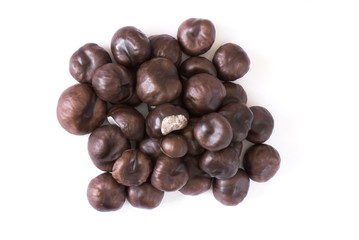 a few brown chestnuts are on a white background