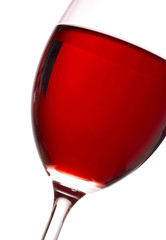 Glass with red wine on white background