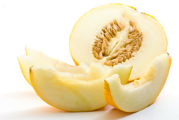 Fresh sliced cantaloupe melon on white background