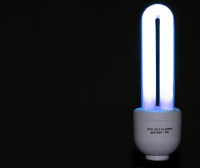 Energy saving cool lamp on black background