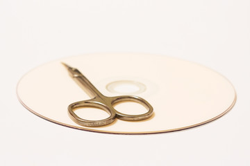 Scissors on a CD
