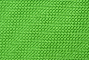 texture of green cotton material as background