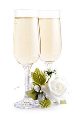 Wineglass of  champagne and bouquet flowers
