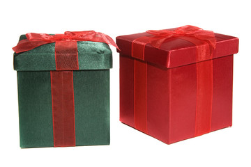 Two neatly wrapped gift boxes isolated over white.