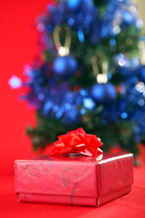 Christmas tree with decorations and gifts.