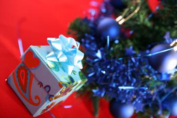 Christmas tree with decorations and gifts.