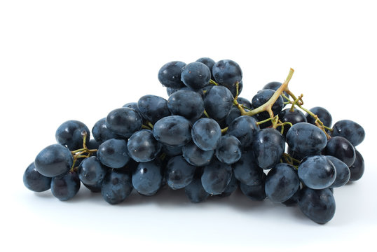 Bunch of blue grapes isolated on the white background