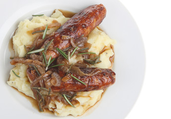 Sausages and mash with red onion and rosemary gravy