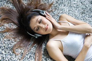 beautiful woman enjoying music