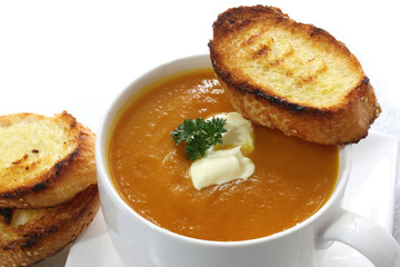 Pumpkin soup with toasted baguette slices