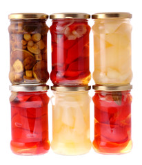 Glass jar of preserved peppers and mushroom