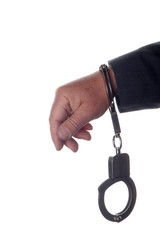 Hand wearing handcuffs
