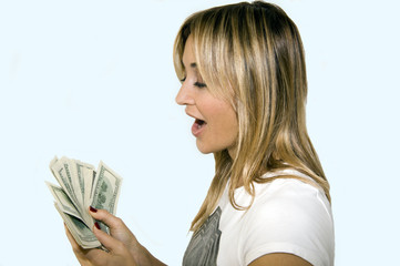 Woman with handful of money