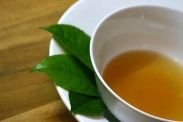 Tea bowl and tea leaves