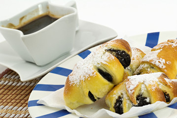 Sweet poppy rolls and coffee