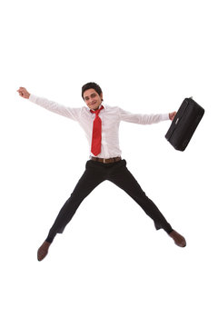 happy businessman jumping very high on white