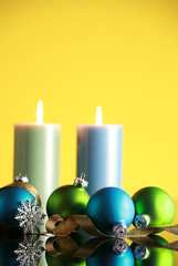 Christmas decorations on yellow background,focus on foreground