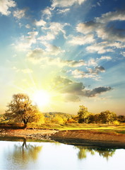 Sunrise scene on mountains lake