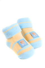little baby socks with teddy bears on a white background