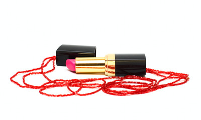 Lipstick and woman decoration isolated on white