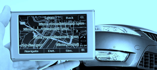 GPS Vehicle navigation system in a man hand