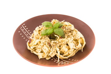 Spaghetti with pesto sauce and cheese