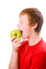 redhead teenager  Caucasian wit green apple