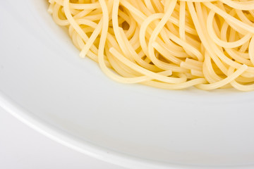 spaghetti in a white plate on clear background