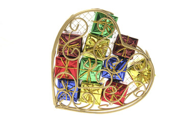 Gift Parcels in Heart-Shaped Metal Box on White Background