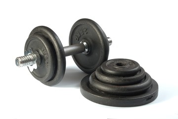 Old dirty dumbbells isolated on white background.