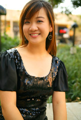 closeup portrait of young pretty asian woman smiling