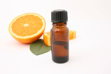 orange with bottle isolated on white