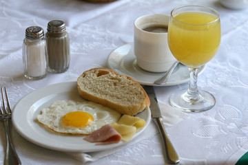 breakfast with fried egg, cheese and pork