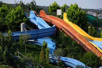 An image of colorful waterslide in summer time