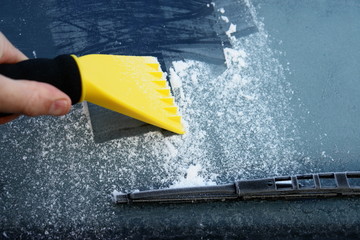 car windshield covered with ice