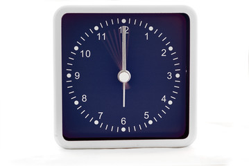 Clock with second hand ticking in slow motion.