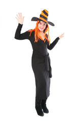 Red girl in halloween striped black-yellow hat