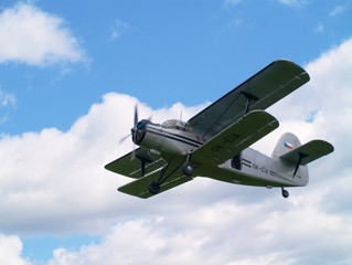 old biplane in the sky
