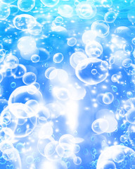 Air bubbles on a soft blue background