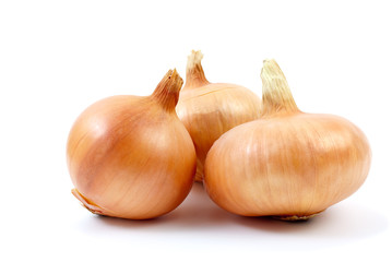 Three onions isolated on the white background