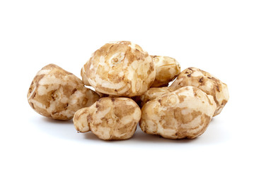 Few topinambours isolated on the white background