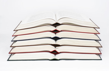 Coloured copened books each other done.