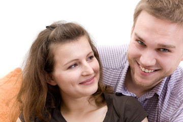 casual couple sitting on sofa